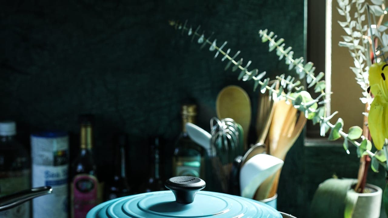 Slow cooker filled with tender pulled pork and barbecue sauce