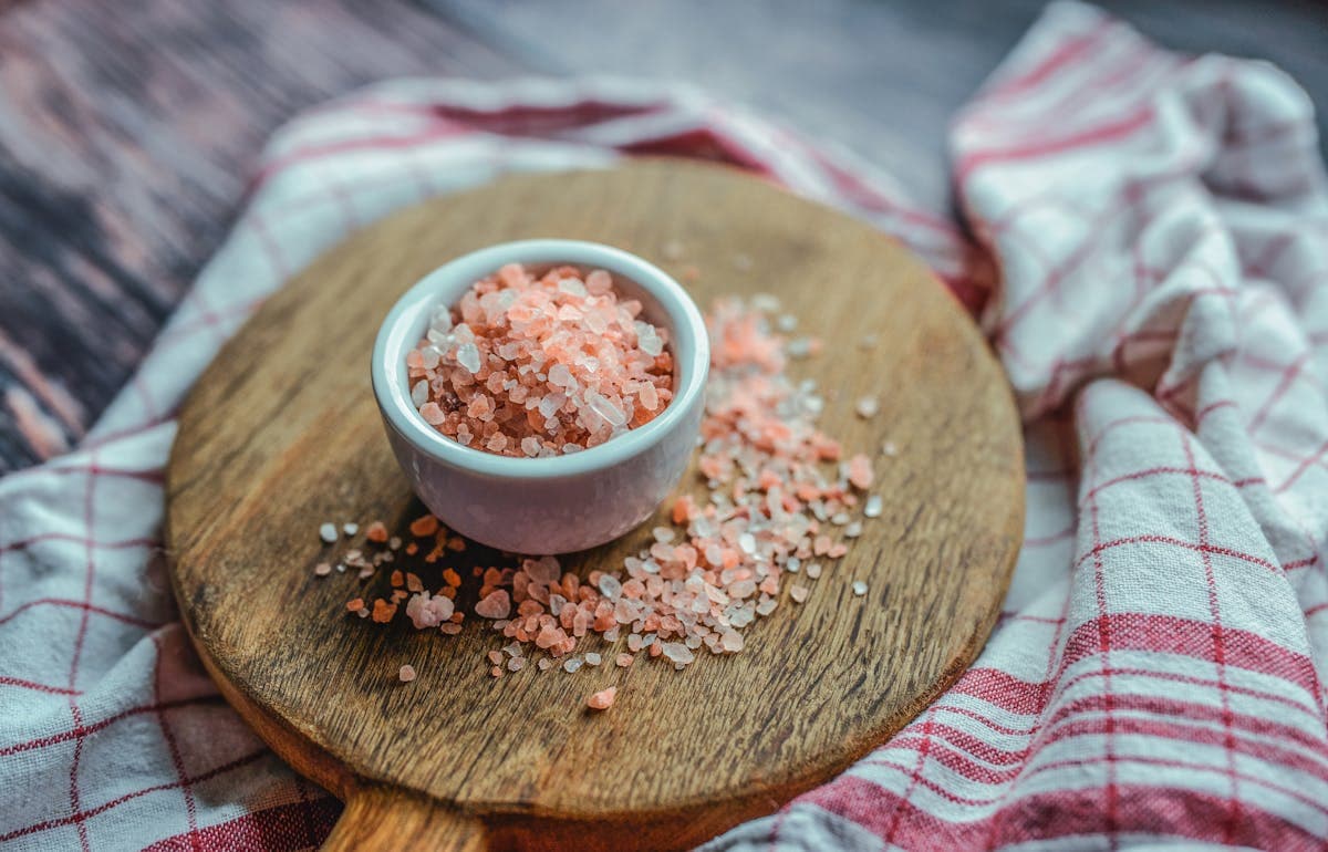 Close-up of pink Himalayan salt crystals used in the viral pink salt recipe for weight loss