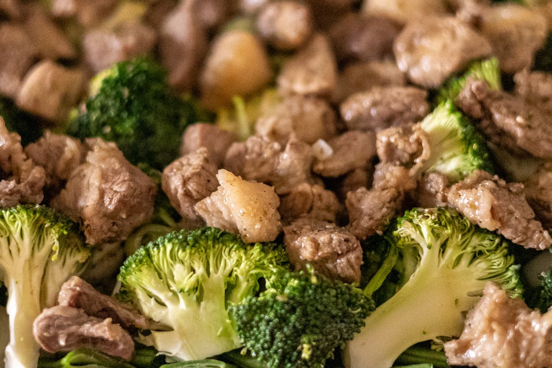 Beef and broccoli stir fry close-up showing tender pieces of beef and bright green broccoli florets